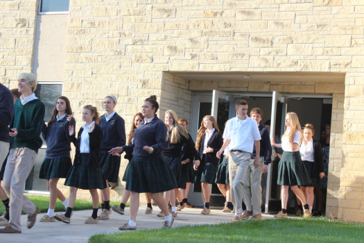 Students evacuate the school during the drill. 