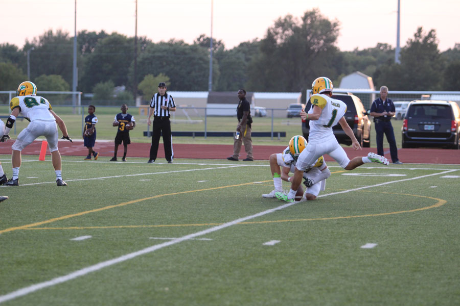 Rodney Steven getting ready to kick a field goal.