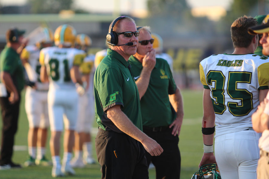 Coaches Trail and Blanton Strategizing during the Northwest Game