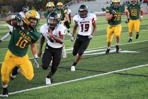 Hunter Trail races down the sideline in the Eagles' victory over Heights on Friday at BC. Photo by Adrie Nordhus.