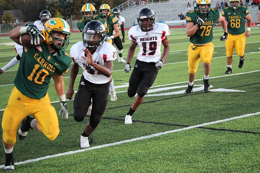 Hunter Trail races down the sideline in the Eagles victory over Heights on Friday at BC. Photo by Adrie Nordhus.