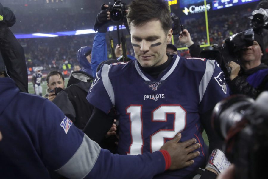 Long time Patriot quarterback Tom Brady leaves the field at Gillette stadium in what could be his final game as a New England Patriot