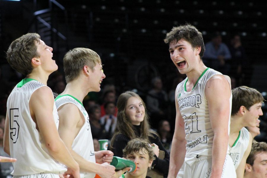 Star Guard Tanner Mans celebrates with his teammates after a huge win earlier in the season 