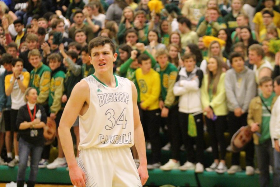 Carroll Junior Forward, Enrique Lankford, hypes up the home crowd in the teams last matchup against the Crusaders 