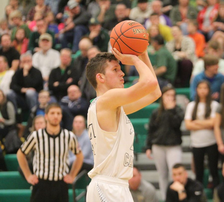 Senior Alex Littlejohn going up for a shot in last years matchup against Maize South